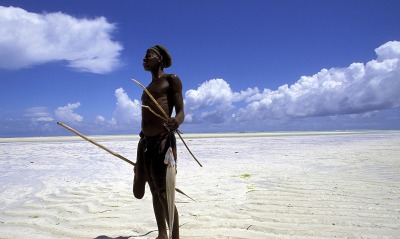 Fisherman on the Beach at Low Tide, Zanzibar, Tanzania